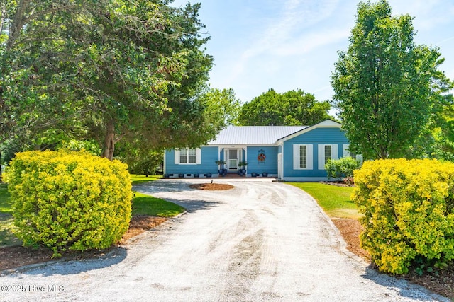 104 Stevens Ct, Swansboro, NC 28584 - ranch-style house with driveway and metal roof