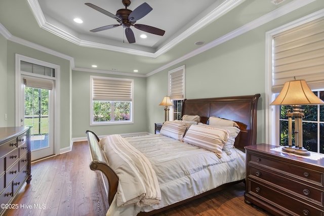 6618 Motts Village Rd, Wilmington, NC 28412 - bedroom featuring access to outside, a raised ceiling, ornamental molding, and dark wood-style floors