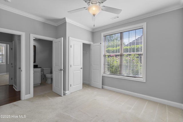 6618 Motts Village Rd, Wilmington, NC 28412 - unfurnished bedroom with crown molding, carpet flooring, baseboards, and visible vents