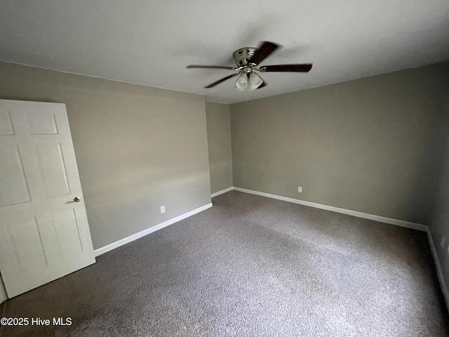 empty room with baseboards, carpet, and ceiling fan