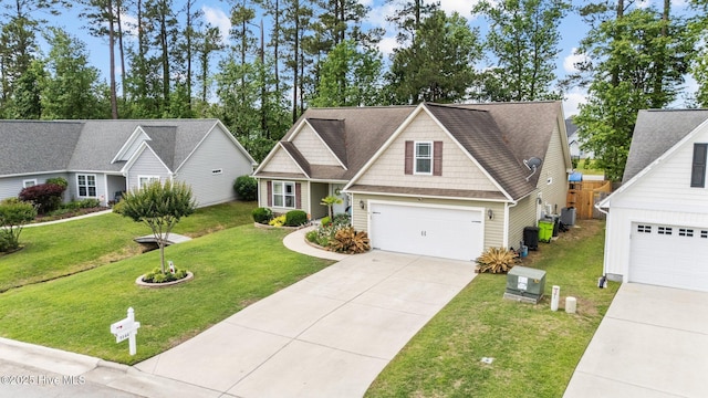 view of front of house with central AC unit, a garage, a front lawn, and concrete driveway