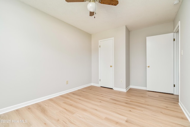 2 Cherokee Dr, Hubert, NC 28539 - unfurnished bedroom with baseboards, ceiling fan, and light wood-style flooring
