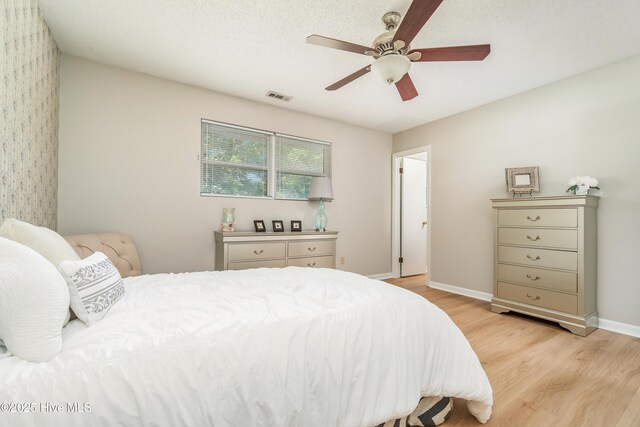2 Cherokee Dr, Hubert, NC 28539 - bedroom featuring ceiling fan, visible vents, baseboards, and light wood-style floors