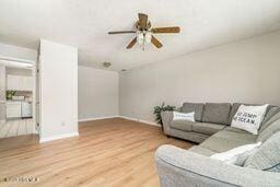 2 Cherokee Dr, Hubert, NC 28539 - living area with baseboards, a ceiling fan, and wood finished floors