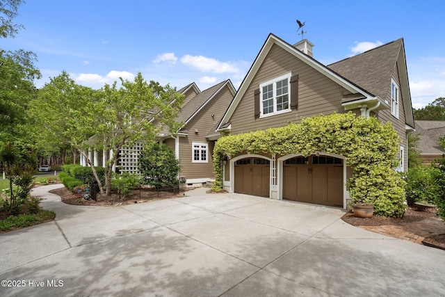 3681 Fairfield Way, Southport, NC 28461 - view of front of property featuring an attached garage, driveway, and a shingled roof