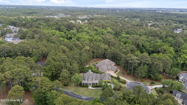 3681 Fairfield Way, Southport, NC 28461 - aerial view of property and surrounding area with a heavily wooded area and nearby suburban area