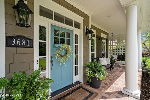 3681 Fairfield Way, Southport, NC 28461 - property entrance with a porch