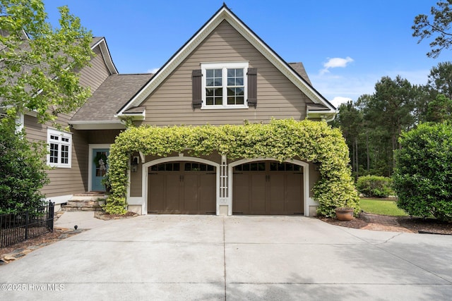 3681 Fairfield Way, Southport, NC 28461 - view of front of house featuring driveway, an attached garage, and a shingled roof