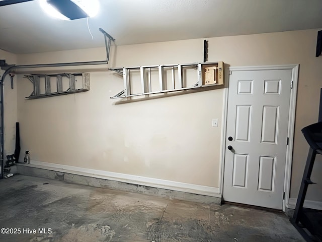 garage featuring baseboards