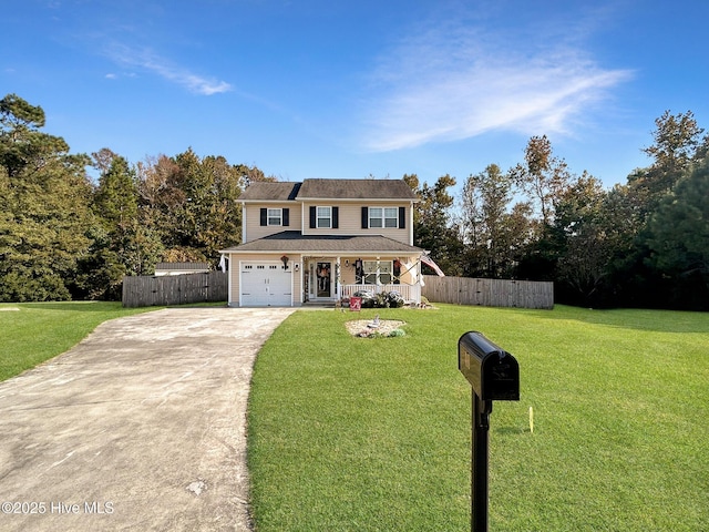 traditional-style house with fence, a front lawn, a porch, and driveway