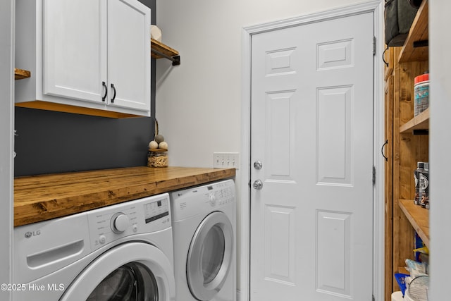 laundry area featuring cabinet space and washing machine and dryer