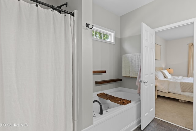 ensuite bathroom with ensuite bath and a bath