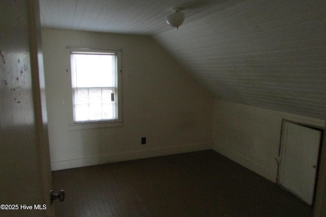 803 Mccoy St, Clinton, NC 28328 - additional living space featuring baseboards and vaulted ceiling