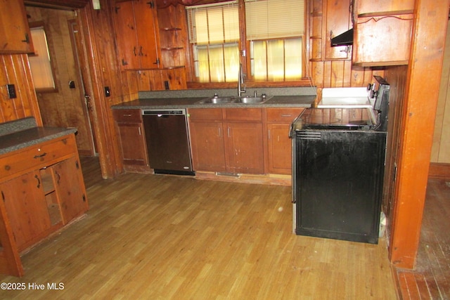 803 Mccoy St, Clinton, NC 28328 - kitchen featuring wood walls, electric range, under cabinet range hood, a sink, and dishwasher