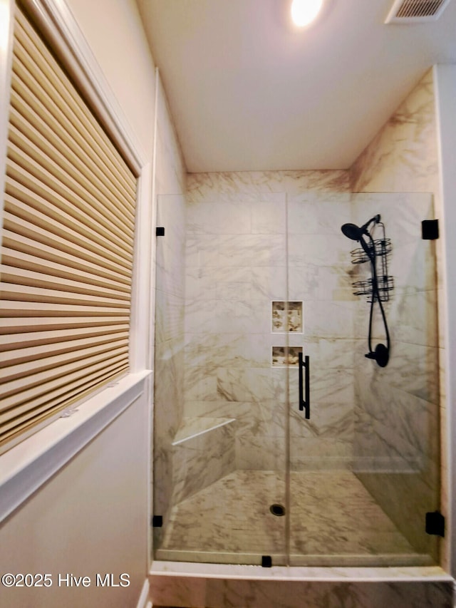 4230 Snapdragon Dr NW, Wilson, NC 27896 - bathroom with toilet, visible vents, wood finished floors, and baseboards