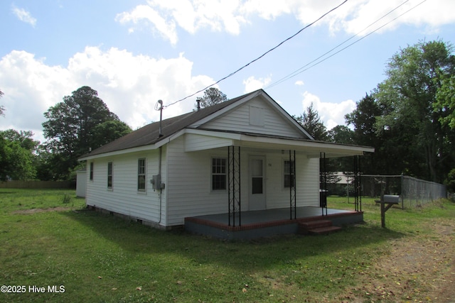 bungalow featuring a porch and a front yard