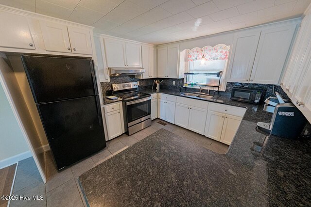 465 Meadstown Rd, Elizabeth City, NC 27909 - kitchen with tasteful backsplash, a sink, tile patterned floors, black appliances, and under cabinet range hood