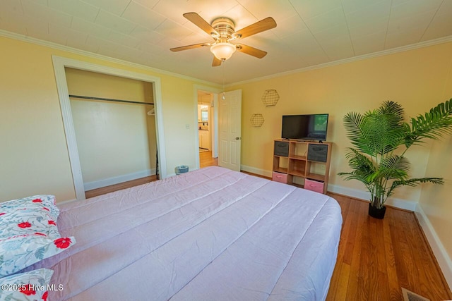 465 Meadstown Rd, Elizabeth City, NC 27909 - bedroom featuring baseboards, ornamental molding, and wood finished floors