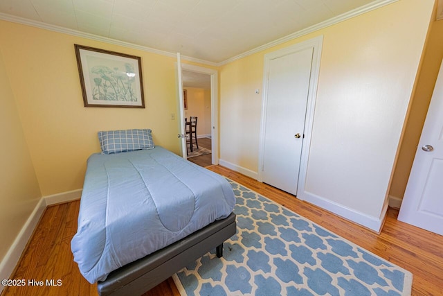 465 Meadstown Rd, Elizabeth City, NC 27909 - bedroom featuring baseboards, crown molding, and wood finished floors