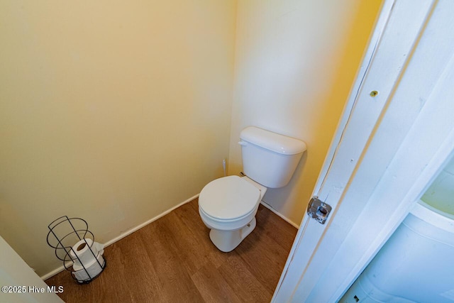 465 Meadstown Rd, Elizabeth City, NC 27909 - bathroom with baseboards, wood finished floors, and toilet