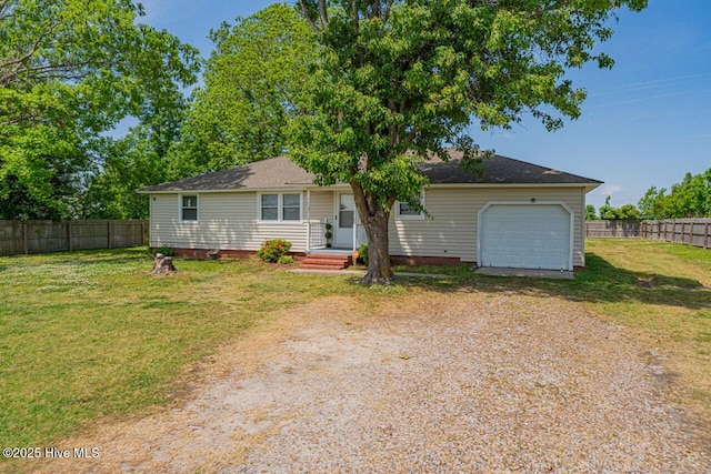 465 Meadstown Rd, Elizabeth City, NC 27909 - single story home with fence, driveway, a front lawn, and a garage