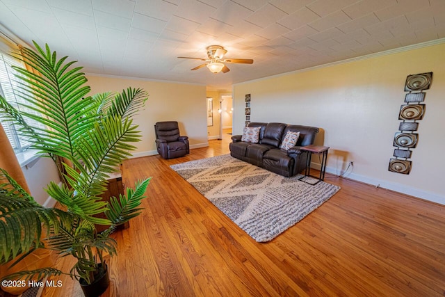 465 Meadstown Rd, Elizabeth City, NC 27909 - living area featuring baseboards, ornamental molding, ceiling fan, and wood finished floors