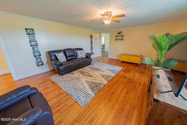 465 Meadstown Rd, Elizabeth City, NC 27909 - living room featuring baseboards, ceiling fan, ornamental molding, and wood finished floors