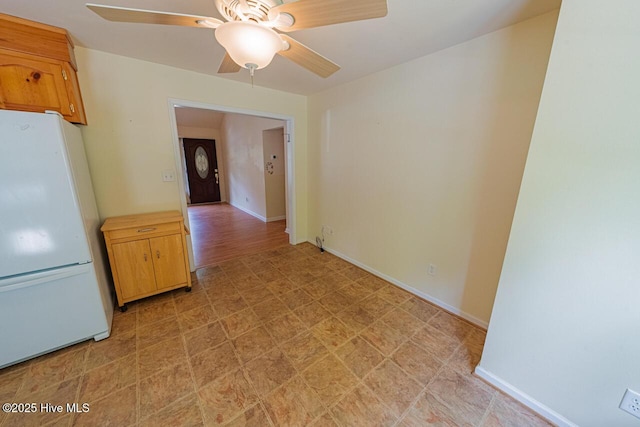 146 Ranch Dr, Elizabeth City, NC 27909 - spare room with light floors, ceiling fan, and baseboards
