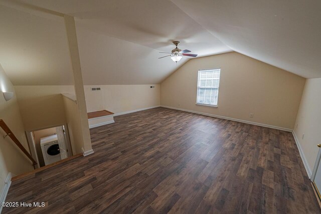 146 Ranch Dr, Elizabeth City, NC 27909 - additional living space with visible vents, lofted ceiling, baseboards, ceiling fan, and dark wood-style floors