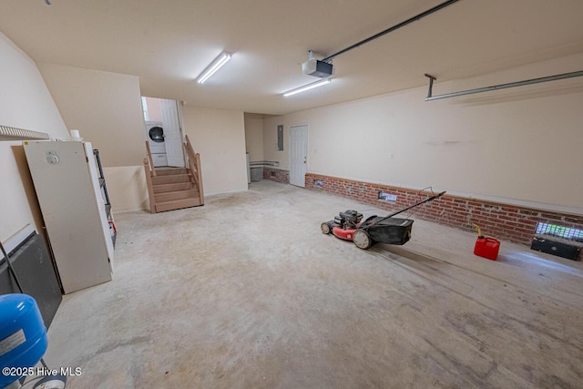 146 Ranch Dr, Elizabeth City, NC 27909 - garage with a garage door opener and washer / dryer