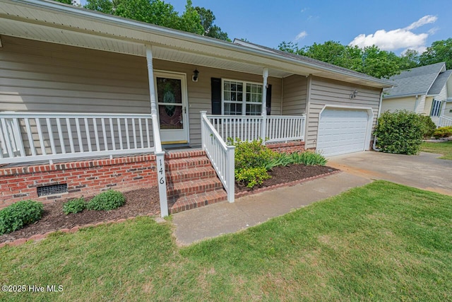 146 Ranch Dr, Elizabeth City, NC 27909 - view of front of property with covered porch, an attached garage, and concrete driveway
