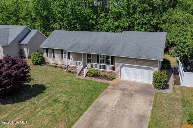 146 Ranch Dr, Elizabeth City, NC 27909 - ranch-style house featuring covered porch, concrete driveway, a front yard, and a garage