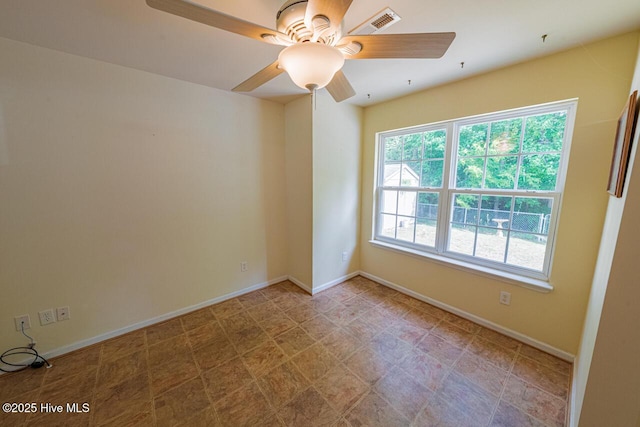 146 Ranch Dr, Elizabeth City, NC 27909 - unfurnished room with baseboards, a ceiling fan, and visible vents