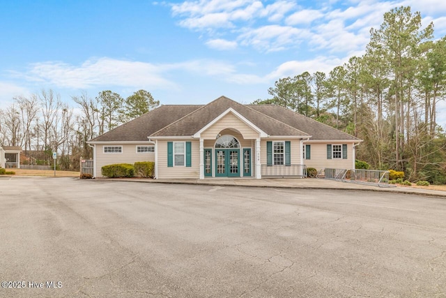 single story home featuring french doors