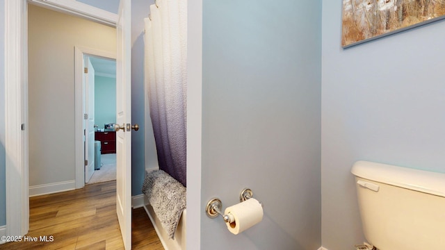 105 Camden Trl, Hampstead, NC 28443 - bathroom featuring wood finished floors, toilet, and baseboards