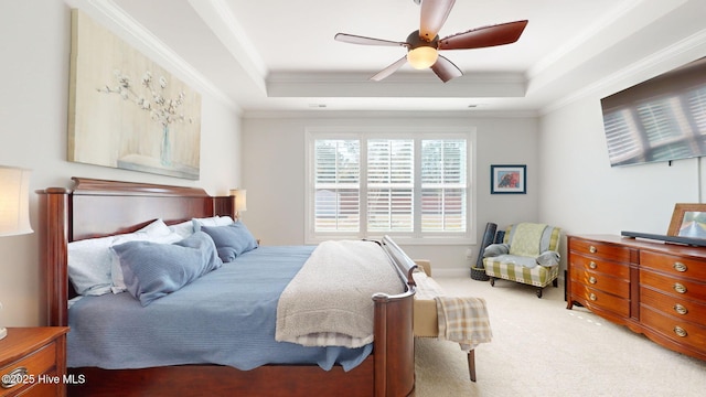 105 Camden Trl, Hampstead, NC 28443 - carpeted bedroom with a tray ceiling, ornamental molding, and a ceiling fan