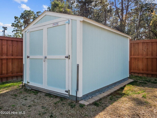 105 Camden Trl, Hampstead, NC 28443 - view of shed featuring a fenced backyard