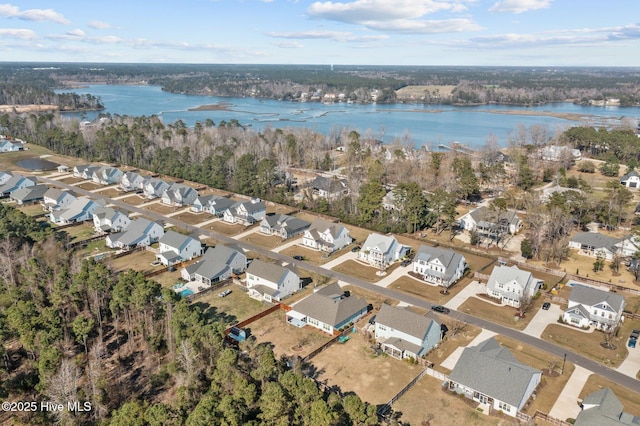 105 Camden Trl, Hampstead, NC 28443 - aerial view of property and surrounding area with a large body of water and nearby suburban area