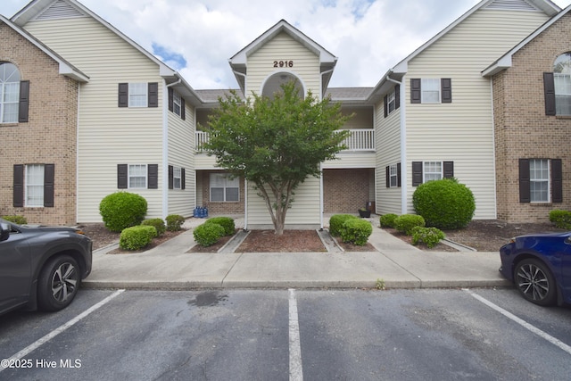 2916 Mulberry Ln Unit E, Greenville, NC 27858 - view of building exterior with uncovered parking