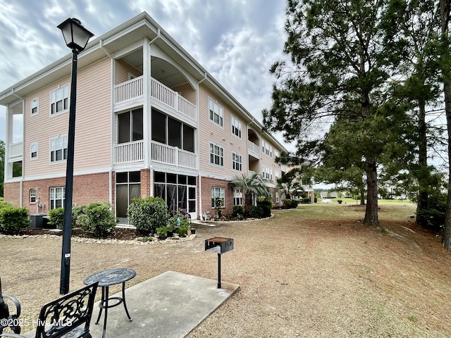 view of building exterior featuring central air condition unit