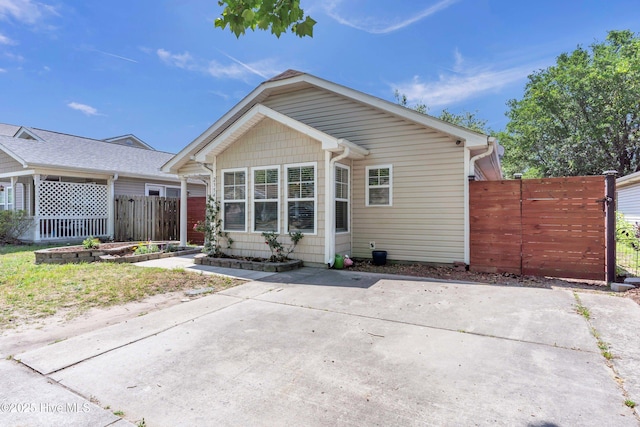 view of front of property with fence