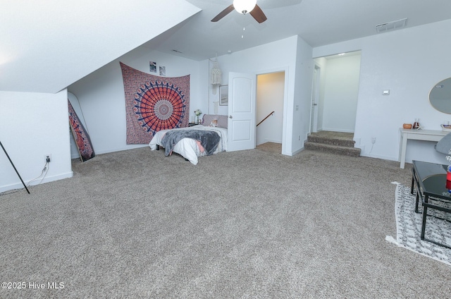 carpeted bedroom with a ceiling fan and baseboards