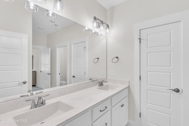 939 Baldwin Park Dr, Wilmington, NC 28411 - full bath featuring toilet and double vanity
