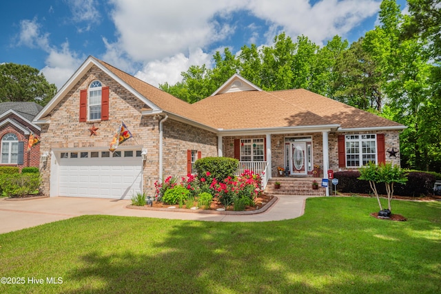 view of front of property with a front lawn, driveway, a shingled roof, and covered porch