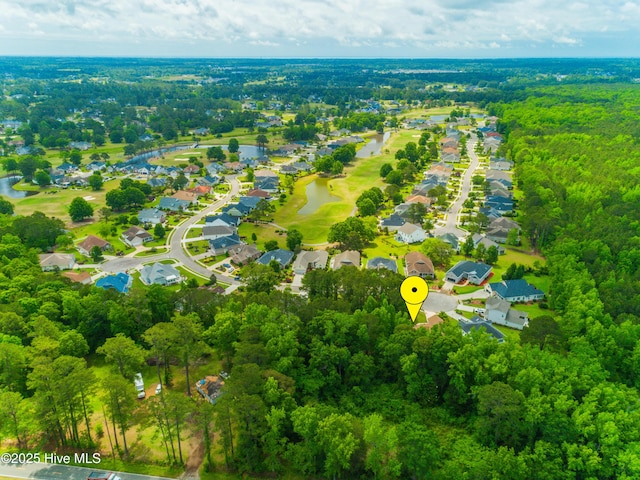 bird's eye view featuring a water view and a residential view