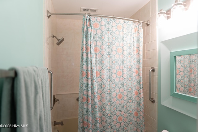 full bath featuring shower / bath combo with shower curtain