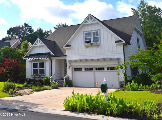 489 Broomsedge Ct SE, Bolivia, NC 28422 - view of front of home featuring board and batten siding, concrete driveway, a shingled roof, and an attached garage