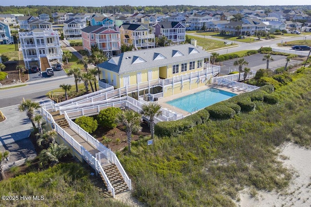 489 Broomsedge Ct SE, Bolivia, NC 28422 - aerial perspective of suburban area featuring a pool