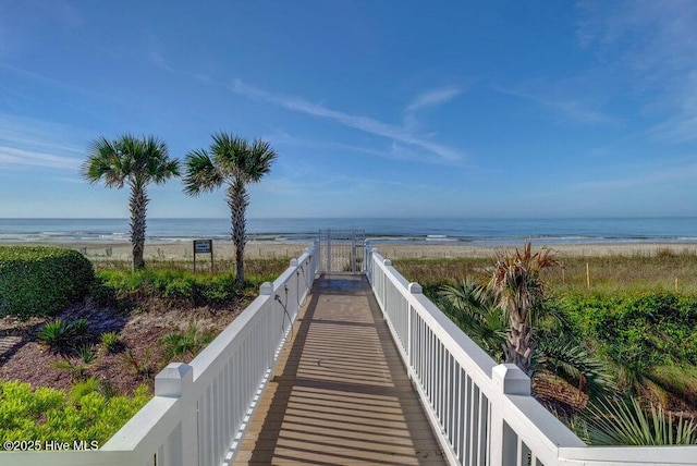 489 Broomsedge Ct SE, Bolivia, NC 28422 - view of property's community with view of water and beach