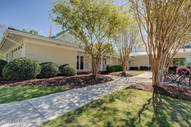 489 Broomsedge Ct SE, Bolivia, NC 28422 - ranch-style house with a front lawn